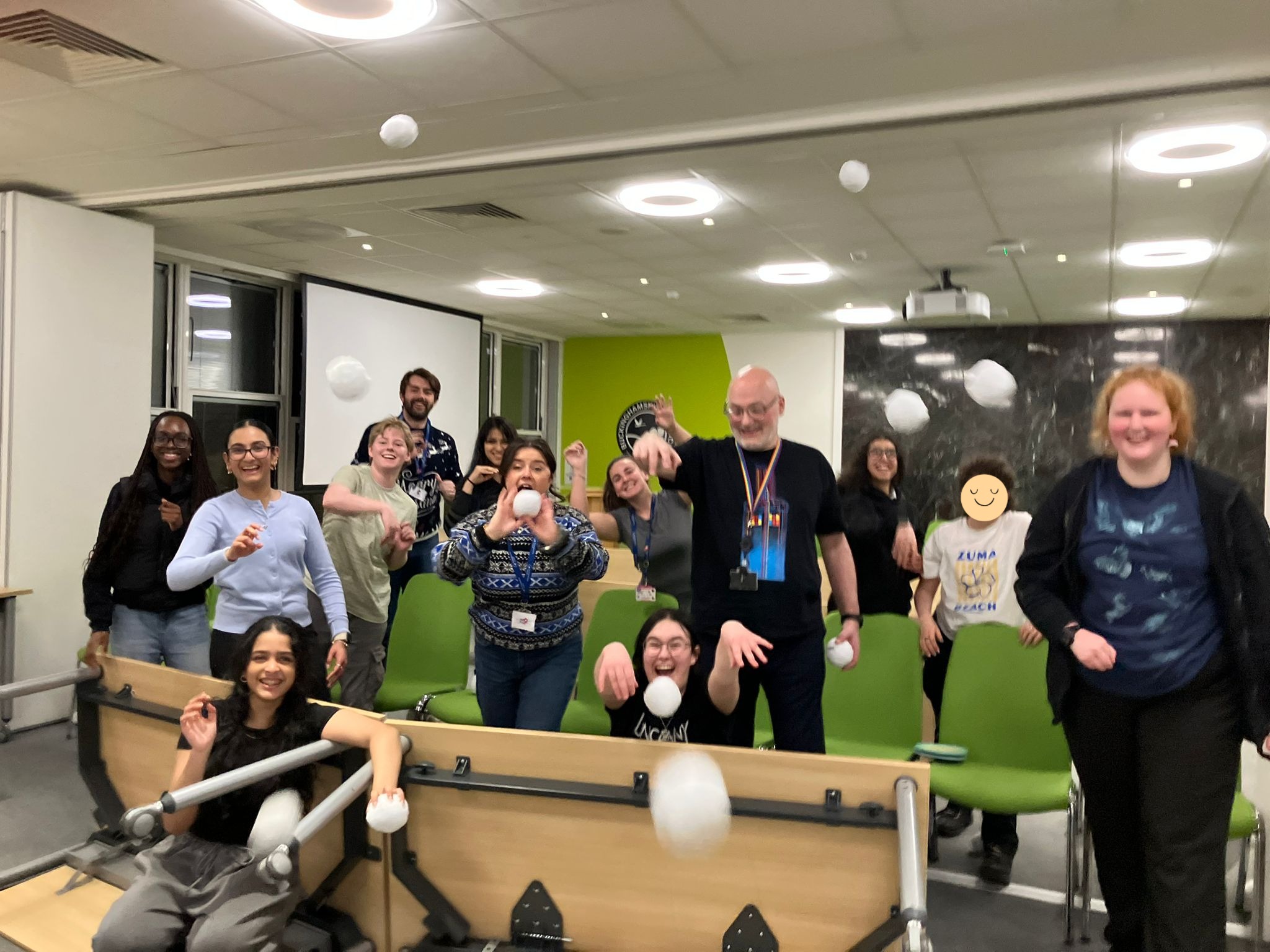 Picture of the group playing the snowball fight game indoors